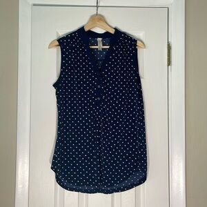 Navy and white polka dot sleeveless work shirt